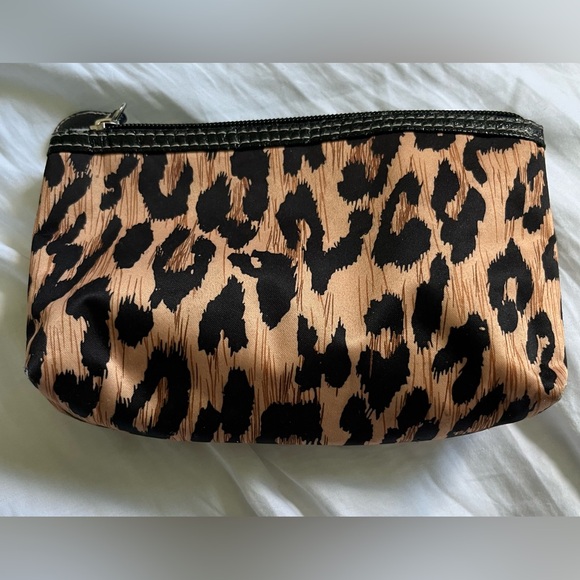 Modella Black and Tan Leopard Cosmetic Bag
7.5” X 5.5” - Picture 2 of 9